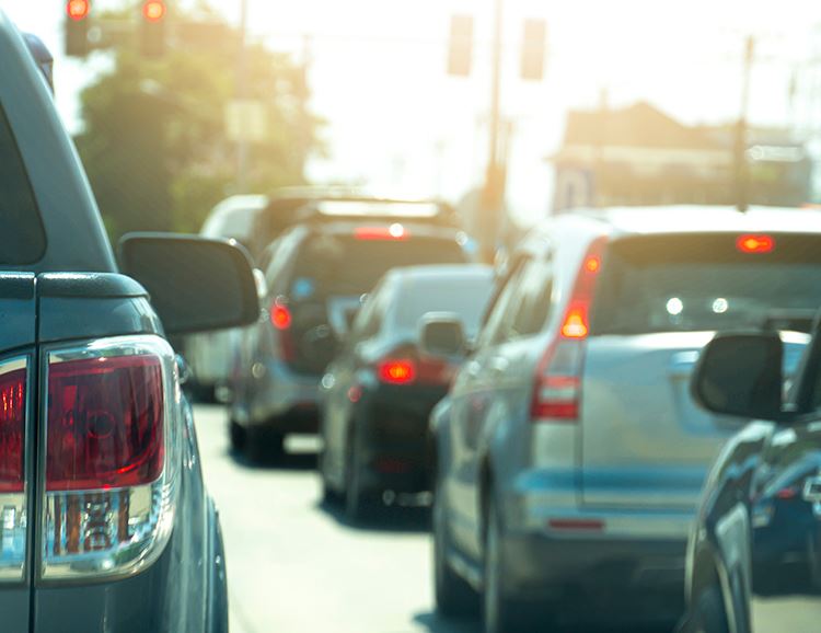 Photos of a line of cars lined up in traffic congestion